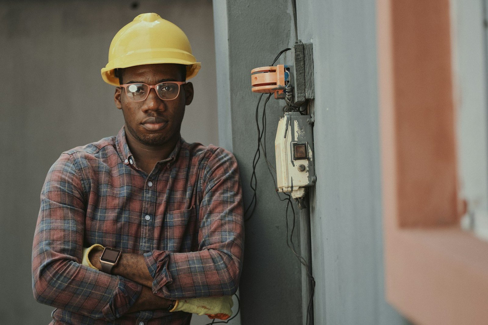 Homeowner checking summer maintenance tasks